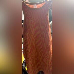 Woman’s dress size L (11-13) sleevesless mini dress with tan and maroon color